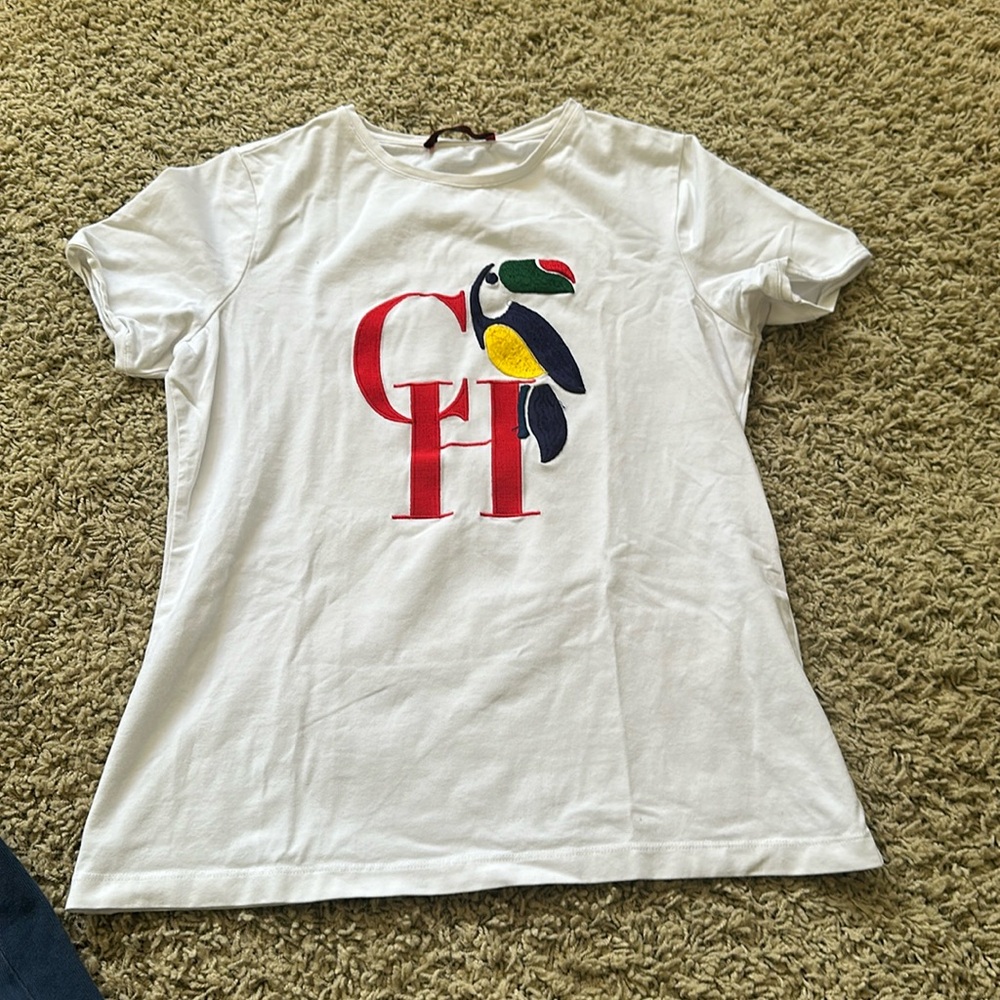 Carolina Herrera white stretch top, embroidered CH/TUCAN